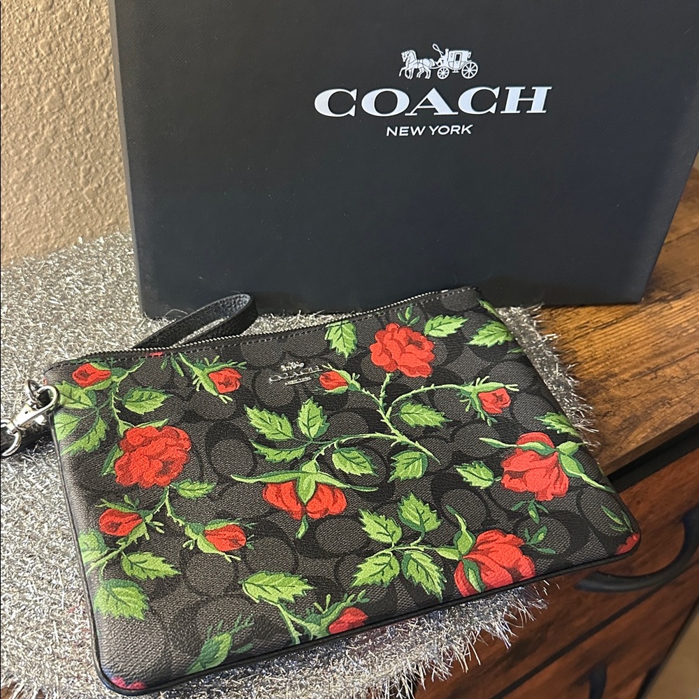 Coach Black Wristlet with Red Floral Design